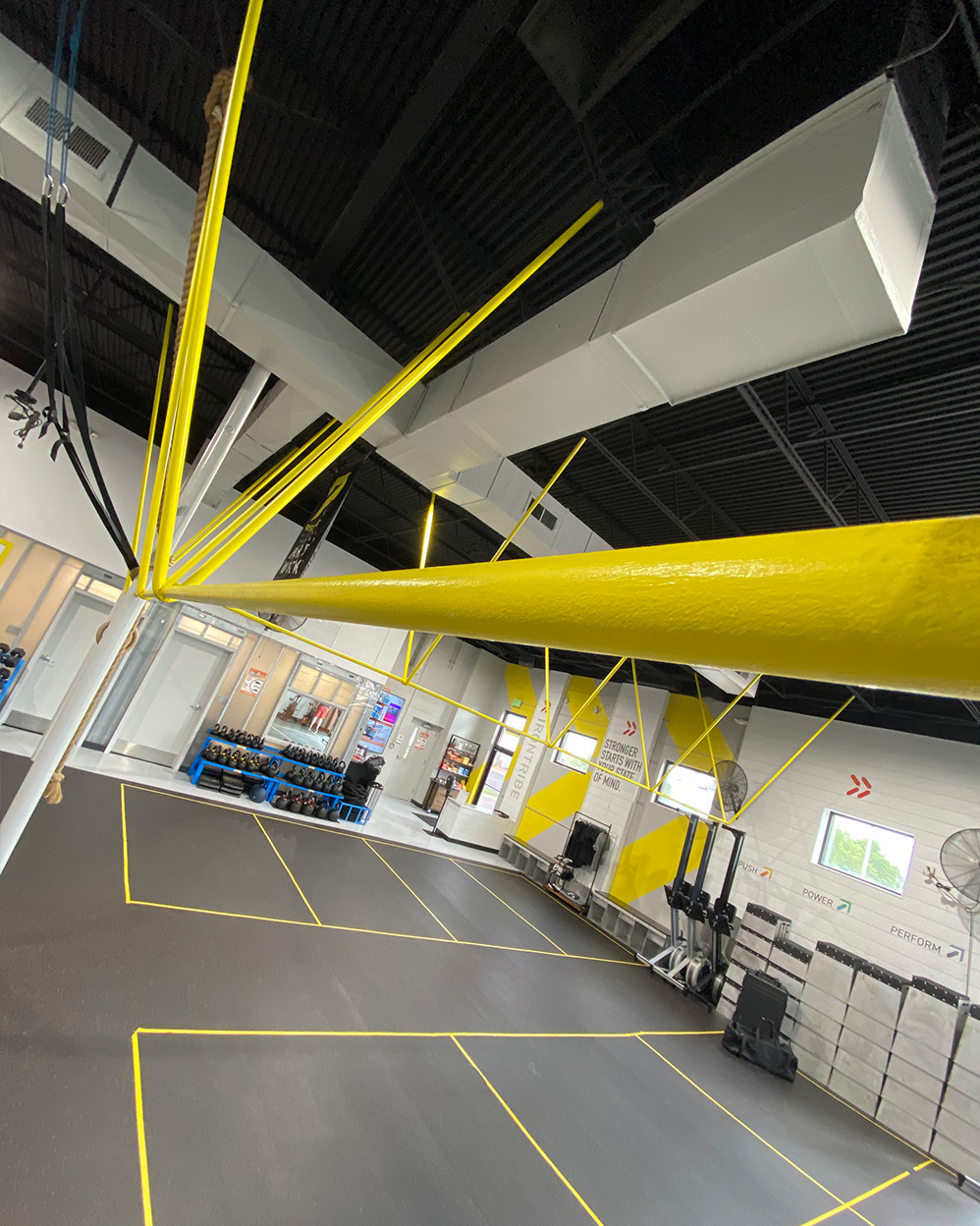 Iron Tribe gym space overhead.