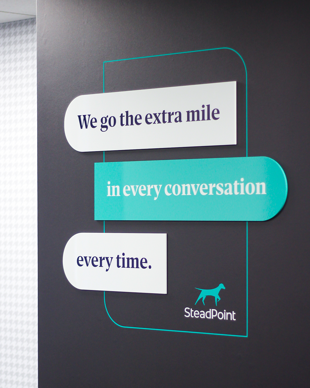Steadpoint wall graphic we go the extra mile.